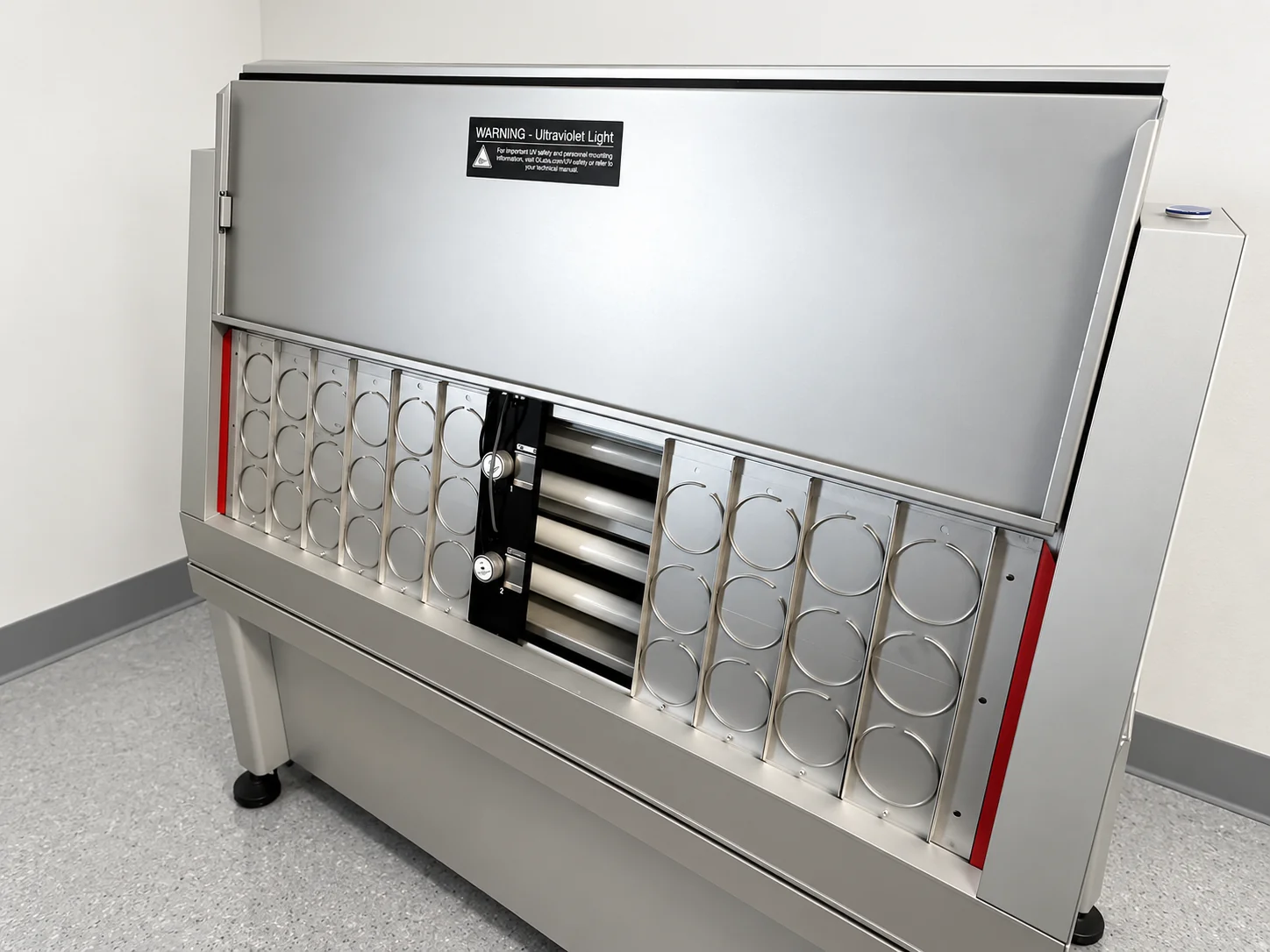QUV accelerated weathering test chamber with open specimen mounting panels and UV lamps